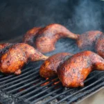 Juicy smoked spatchcock chicken with crispy skin, served fresh off the grill for a flavorful BBQ meal